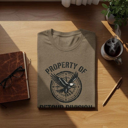 Rugged Detour Division Compass Eagle Tee Wilderness Shirt: Tan t-shirt with eagle and compass graphic reading "PROPERTY OF DETOUR DIVISION".
