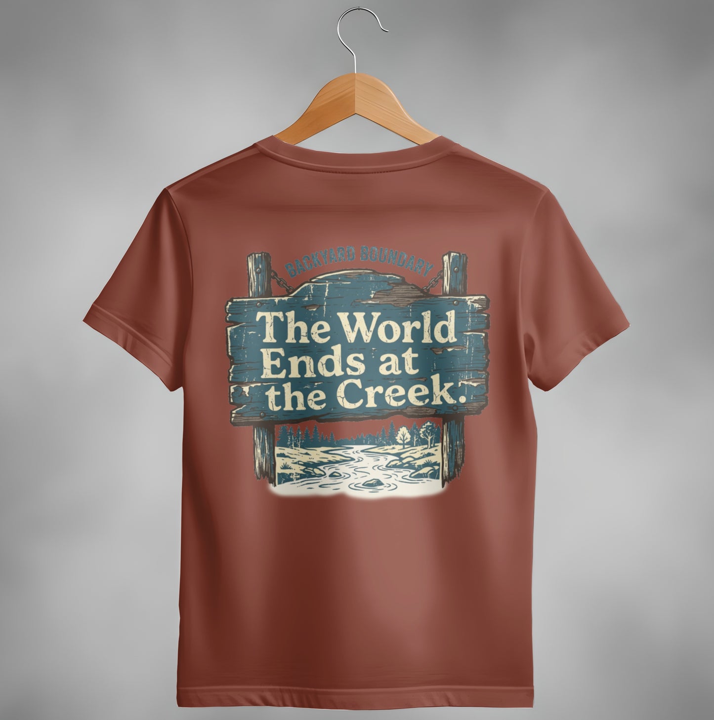 T-shirt with distressed wooden sign "The World Ends at the Creek".