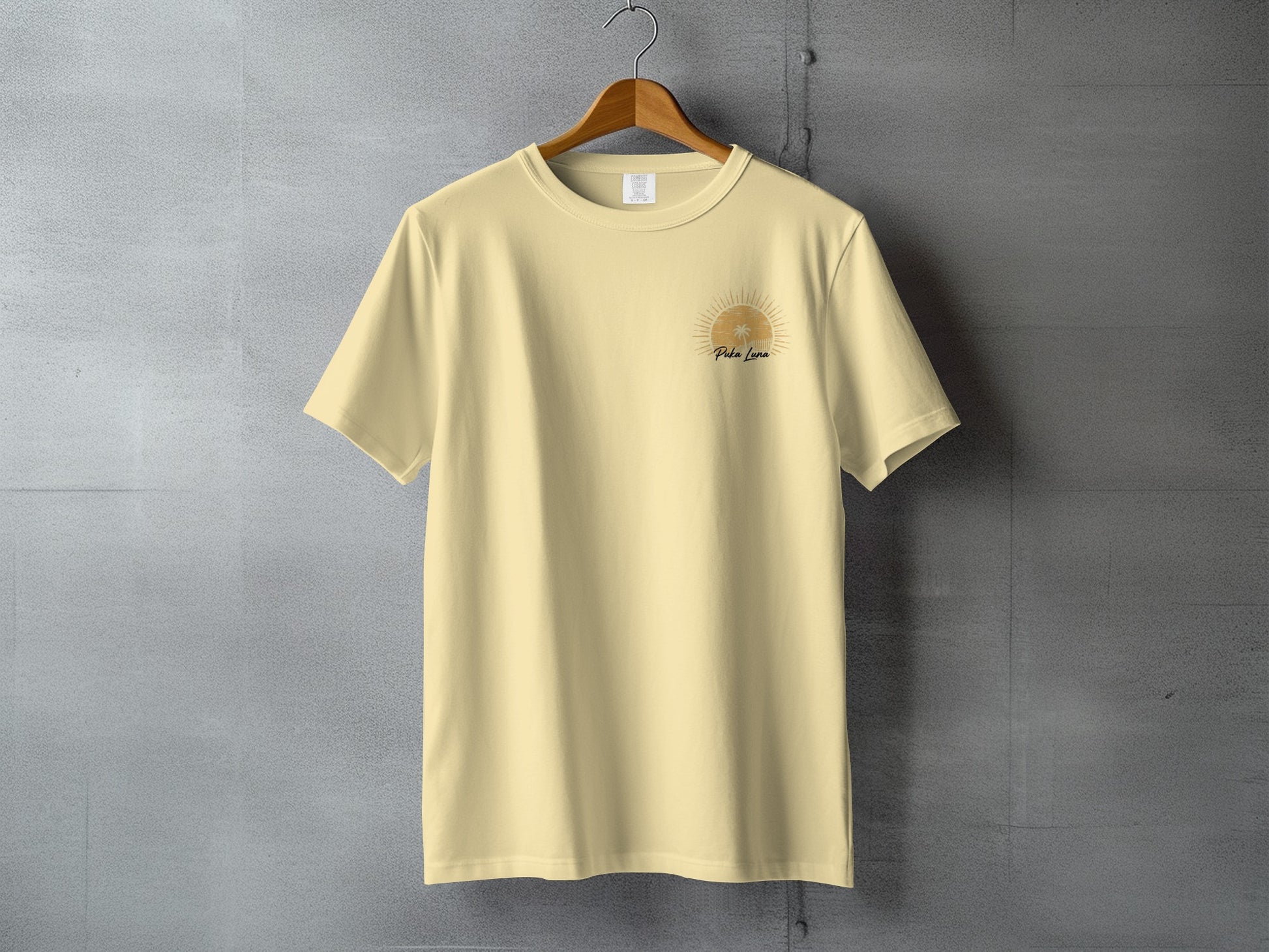Light yellow t-shirt with palm tree sun logo and "Palm Luna" text.