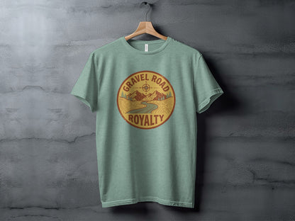 Gravel Road Royalty Adventure Tee | Vintage Outdoor Apparel: Green t-shirt with "Gravel Road Royalty" circular logo featuring mountains and a road.