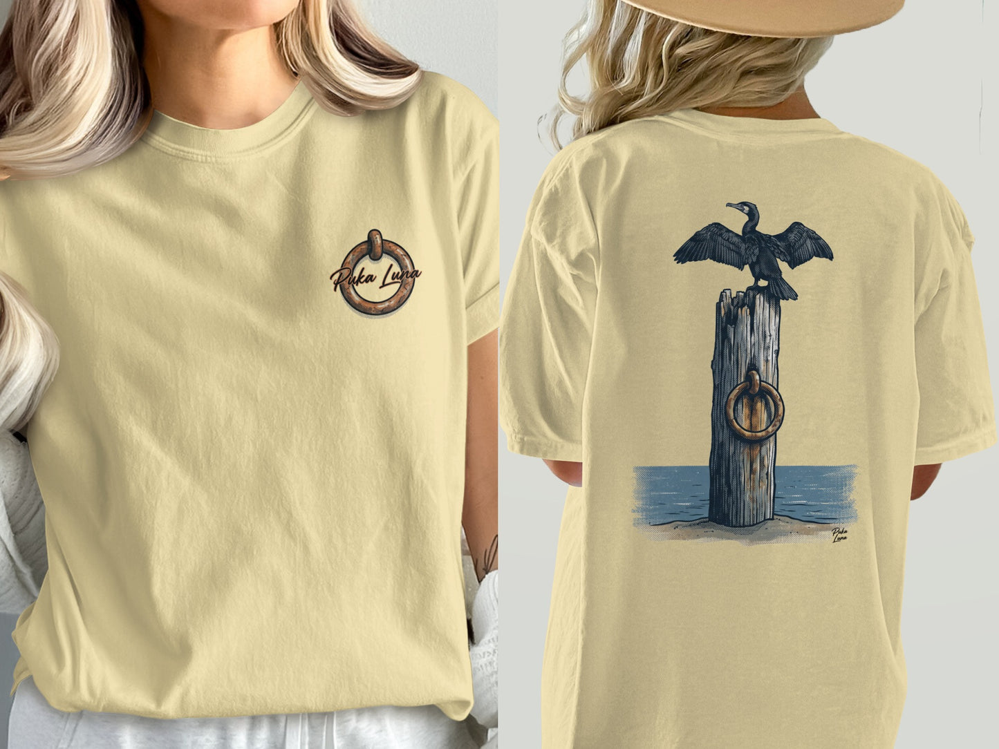 Cream t-shirt with nautical graphic on front and cormorant on post on back.