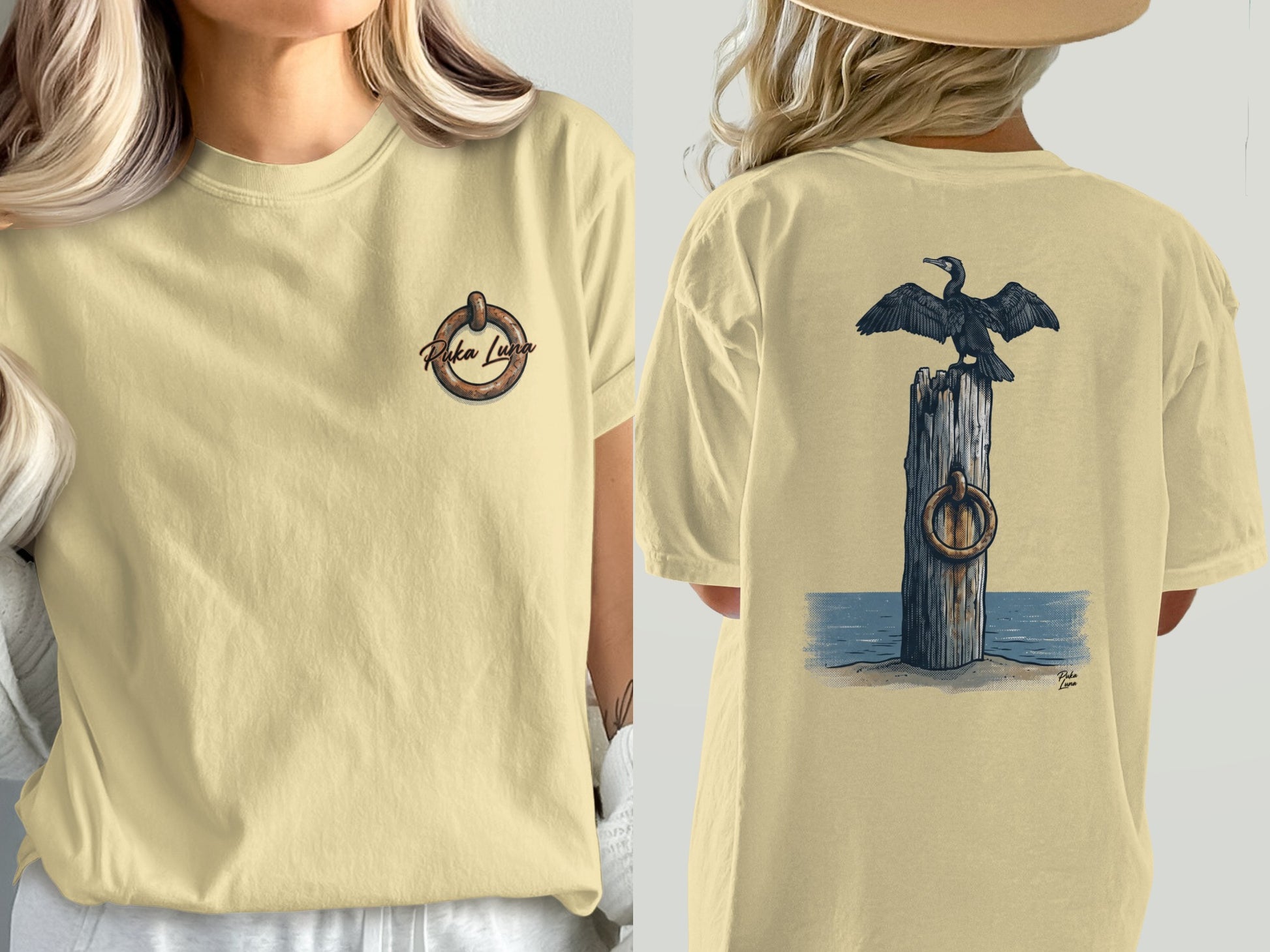 Cream t-shirt with nautical graphic on front and cormorant on post on back.