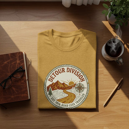 Detour Division Heritage | Vintage Outdoor Apparel: Mustard t-shirt with "Detour Division Est. 1974 Road Less Traveled" circular logo.