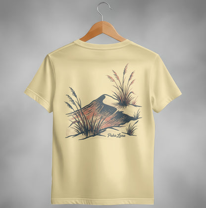 Light yellow t-shirt with Puka Luna text and desert landscape graphic.