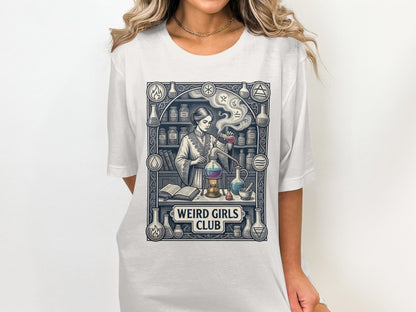 Woman in a lab coat mixing potions in a laboratory, "Weird Girls Club" text.