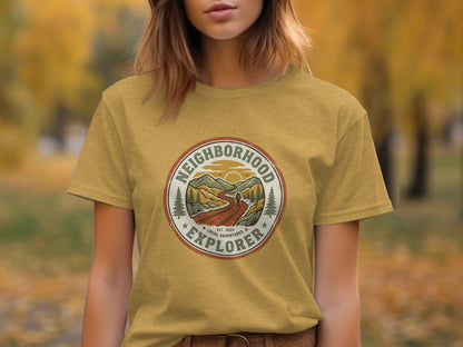 The Original Neighborhood Explorer Adventure Adventure Top: Yellow t-shirt with circular "Neighborhood Explorer Local Adventures" graphic.