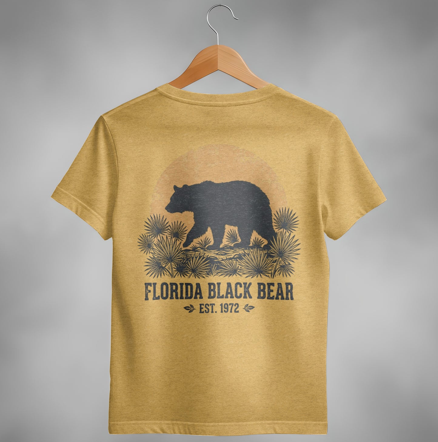 Silhouette of a black bear walking through palm fronds with a sun graphic.