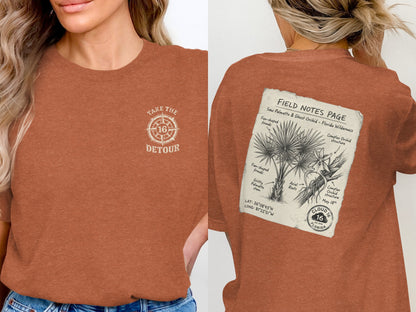 Brown t-shirt with "Take the Detour 16" on front and botanical illustration of Saw Palmetto on back.