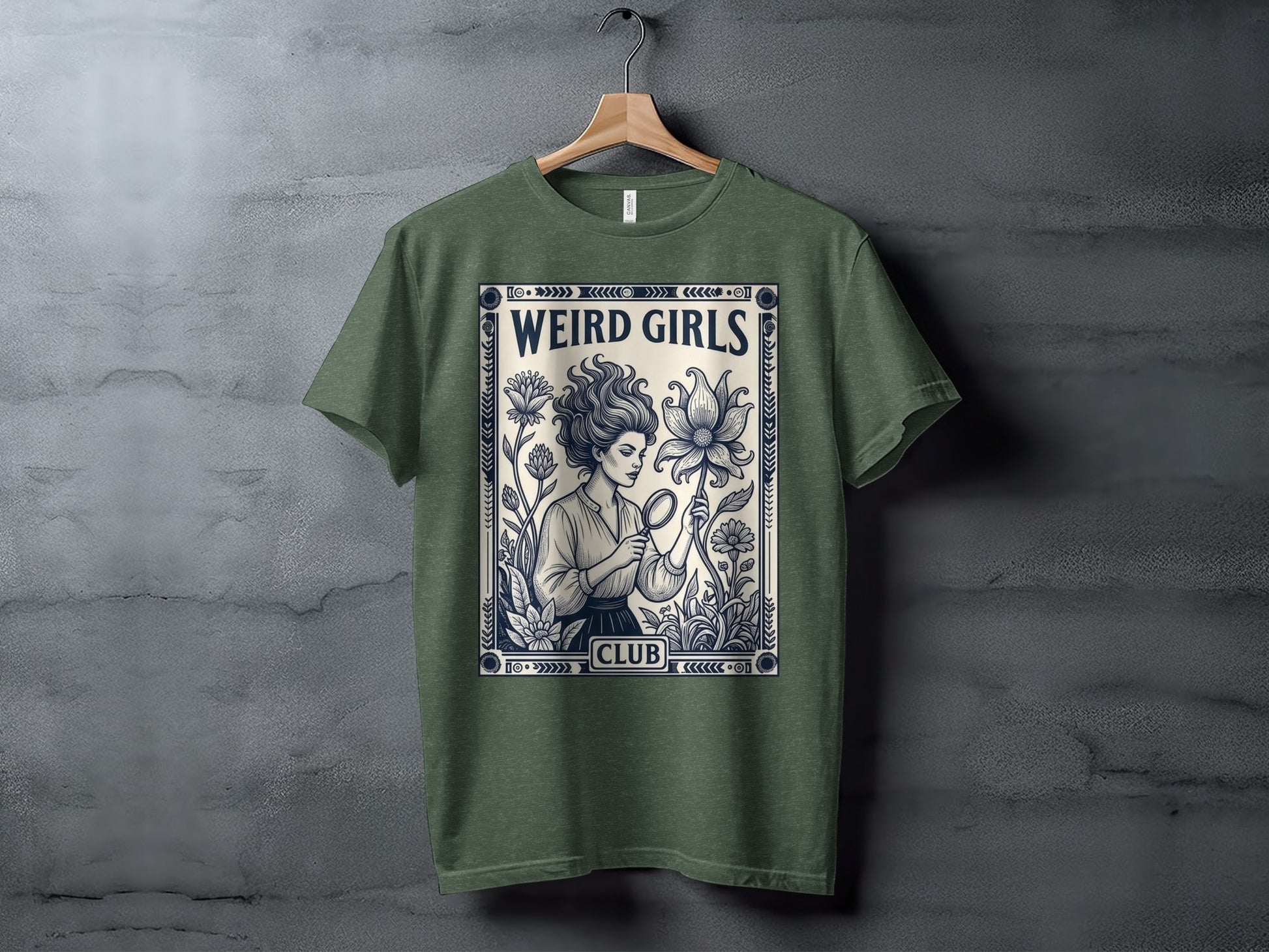 T-shirt featuring "Weird Girls Club" with a woman examining a flower.