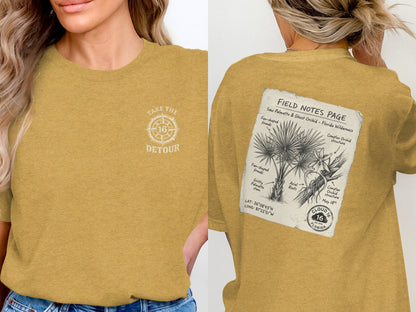 T-shirt with "Take the Detour" logo on front and field notes graphic on back.