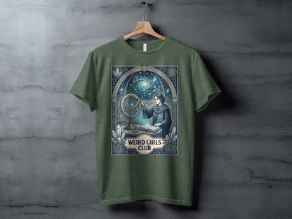 Green t-shirt with celestial-themed graphic featuring a woman with an orrery.