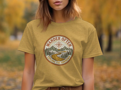 The Original Wander Often Vintage Explorer Adventure Top: T-shirt with circular graphic: "Wander Often Explore the Unknown" text and mountain scene.