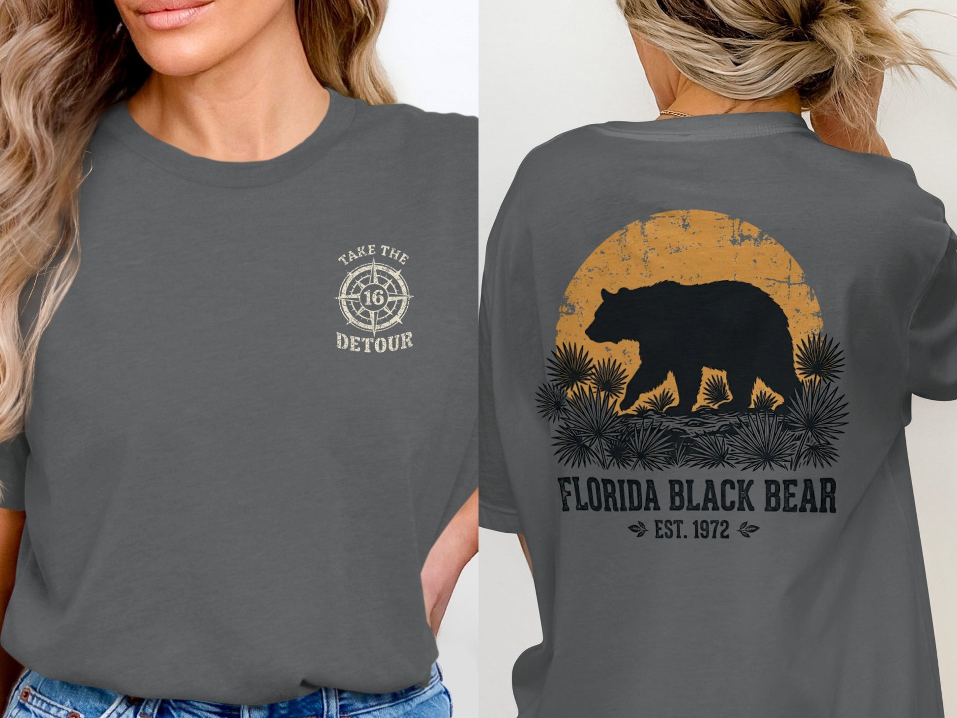 Front: Compass graphic with text "TAKE THE 16 DETOUR." Back: Black bear silhouette at sunset over grass.