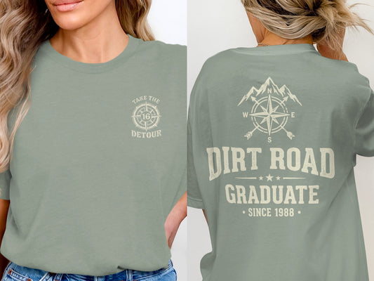 Green t-shirt with "Take the Detour" on front and "Dirt Road Graduate" on back.