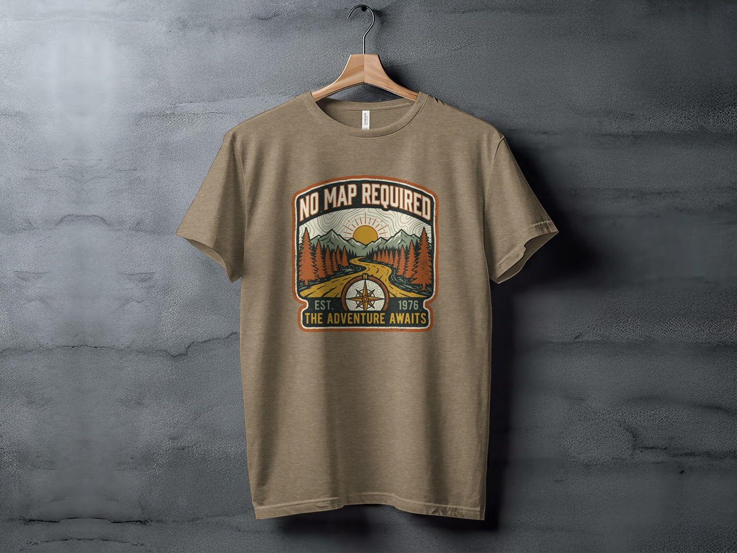 Heritage No Map Required: The Adventure Awaits Nomad Tee: Tan t-shirt with a circular vintage design: "No Map Required" and "The Adventure Awaits".