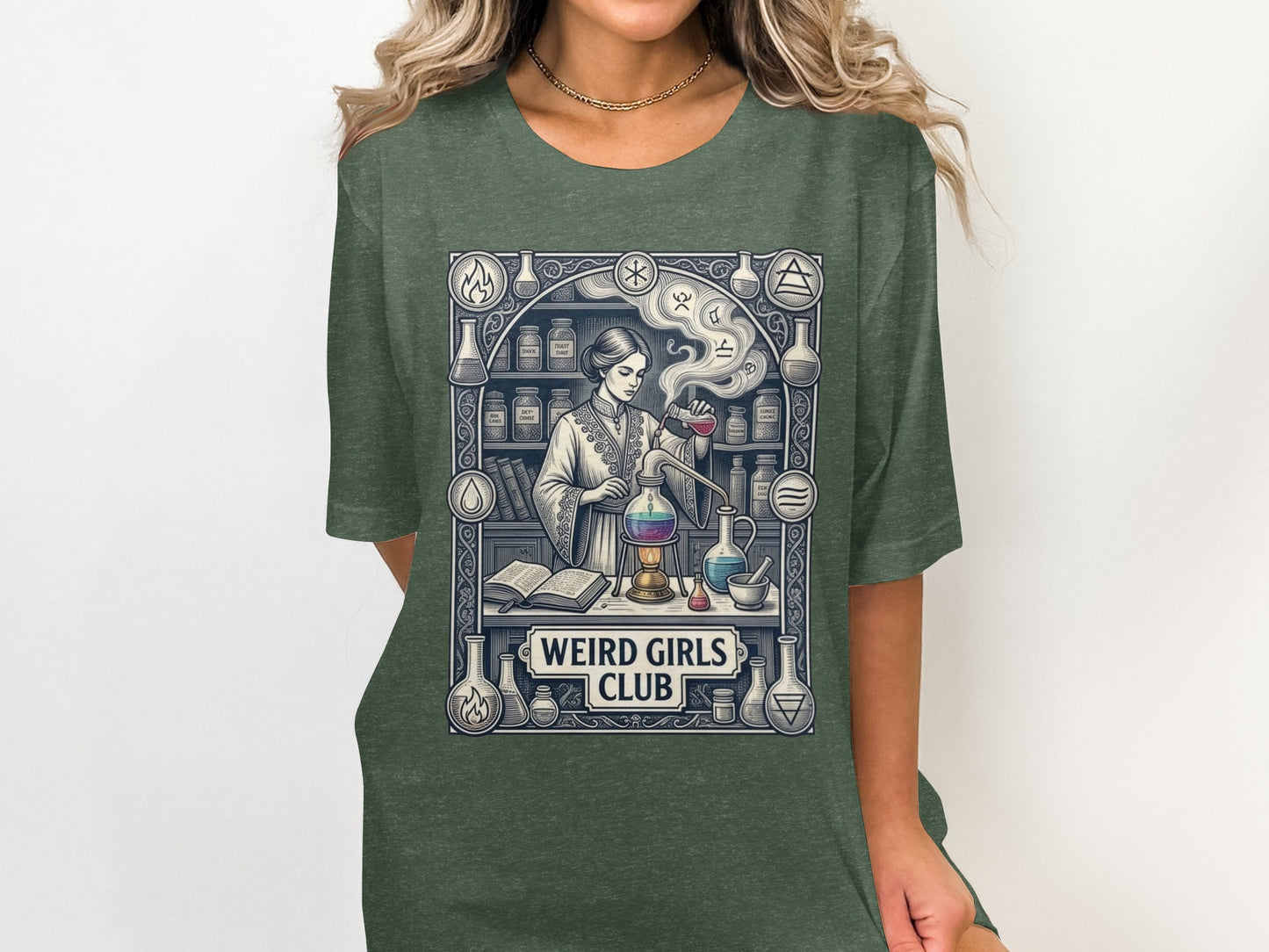 Woman in dark green t-shirt with "Weird Girls Club" chemistry illustration.