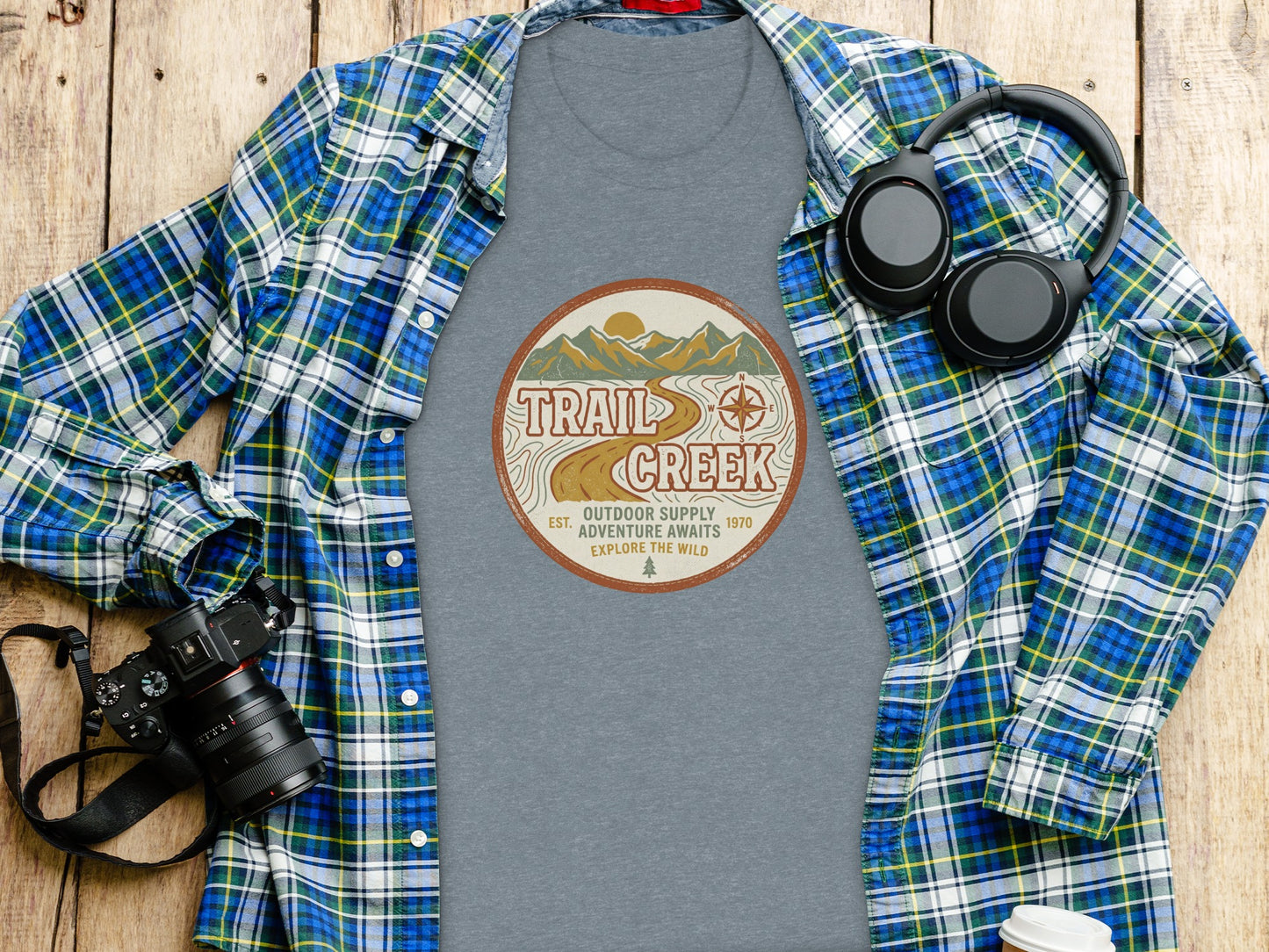 Heritage Heritage Explorer Trail Creek Nomad Tee: Gray t-shirt with "Trail Creek Outdoor Supply Adventure Awaits Explore the Wild" graphic.