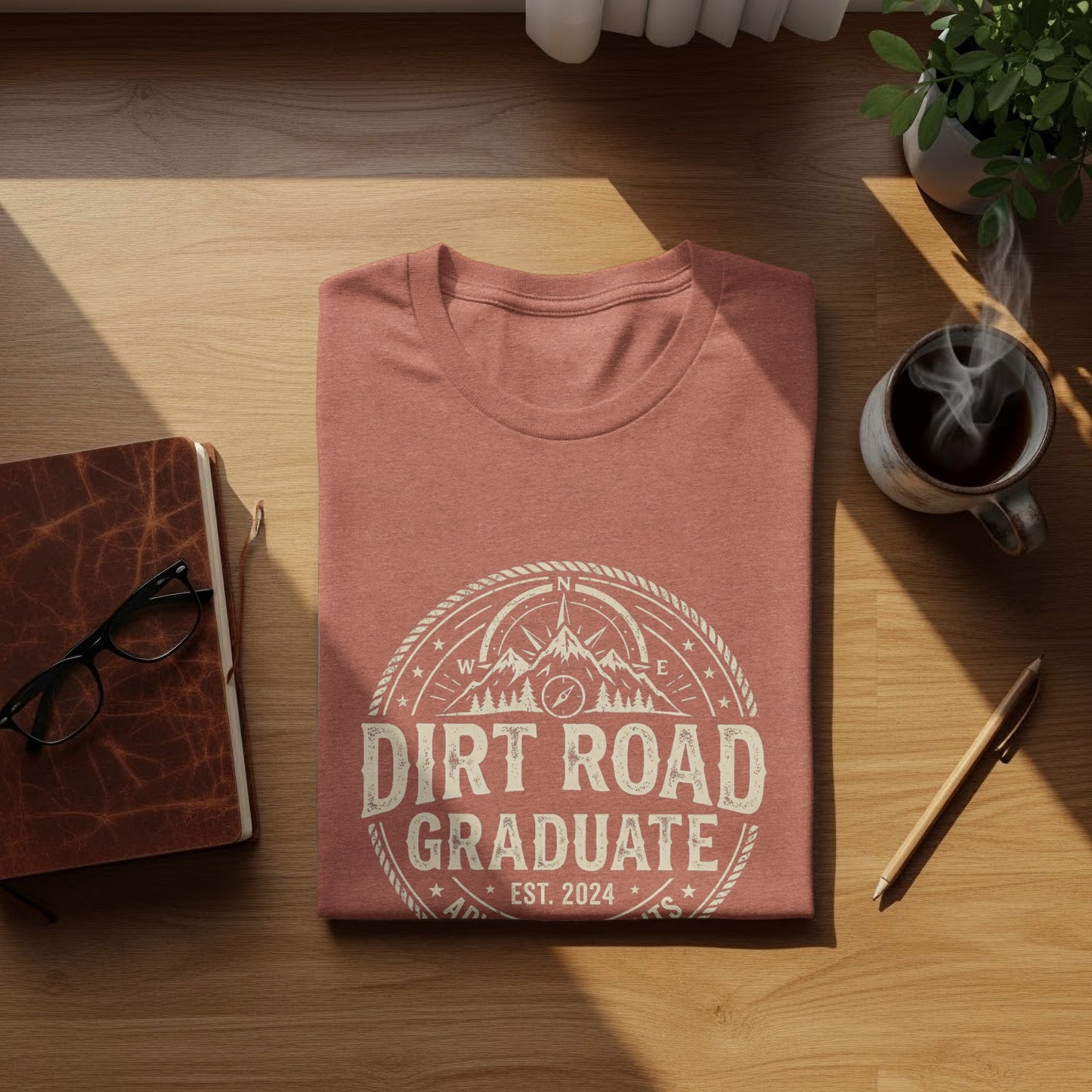 Dirt Road Graduate '24 Adventure | Vintage Outdoor Apparel: T-shirt with "Dirt Road Graduate EST. 2024" graphic.