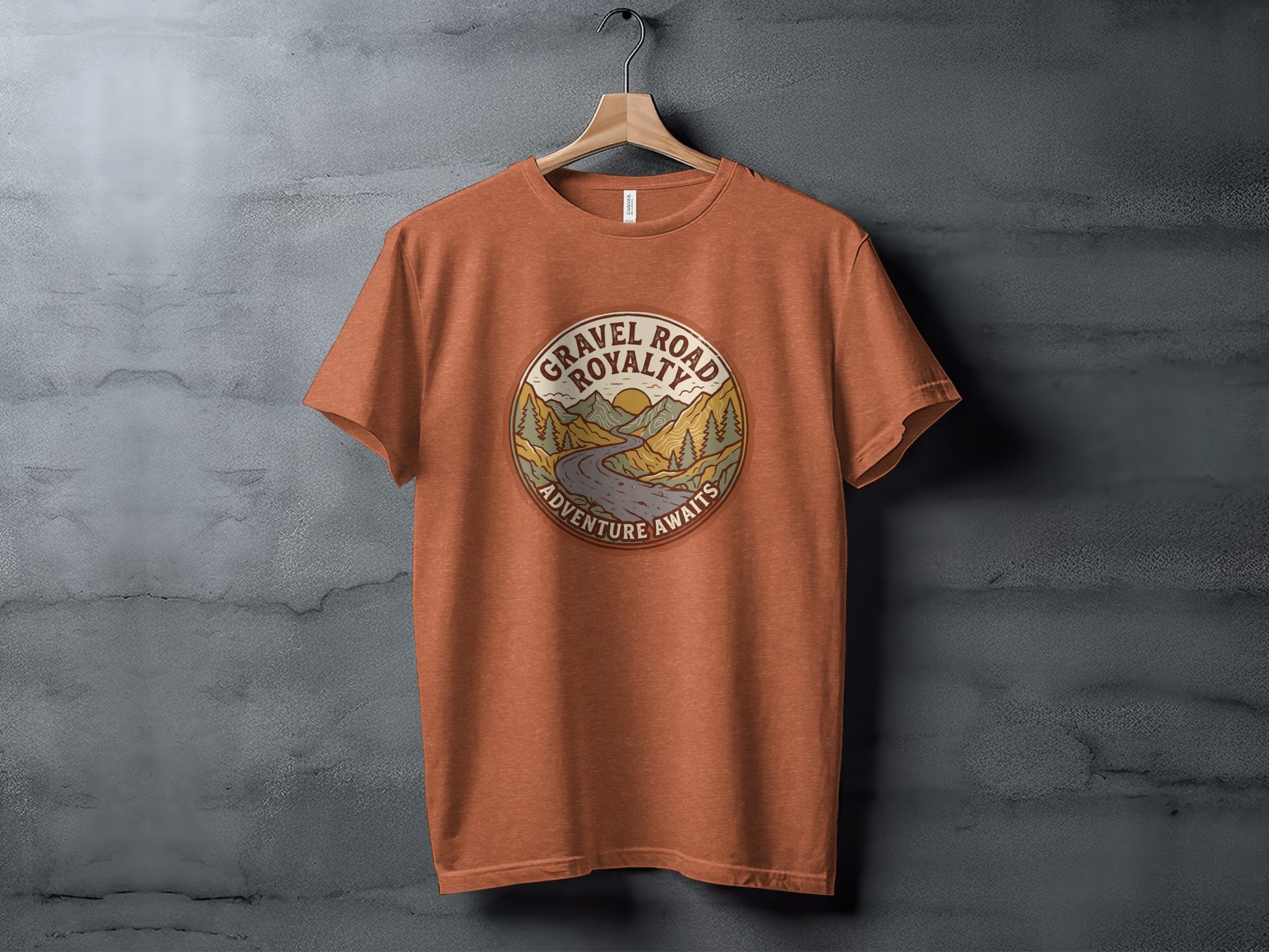Gravel Road Royalty Vintage Adventure Tee: Backcountry Outpost Shirt: Gravel Road Royalty t-shirt with mountain and road adventure graphic.