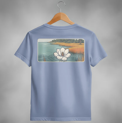 Blue t-shirt with illustration of a water lily on water with reeds.