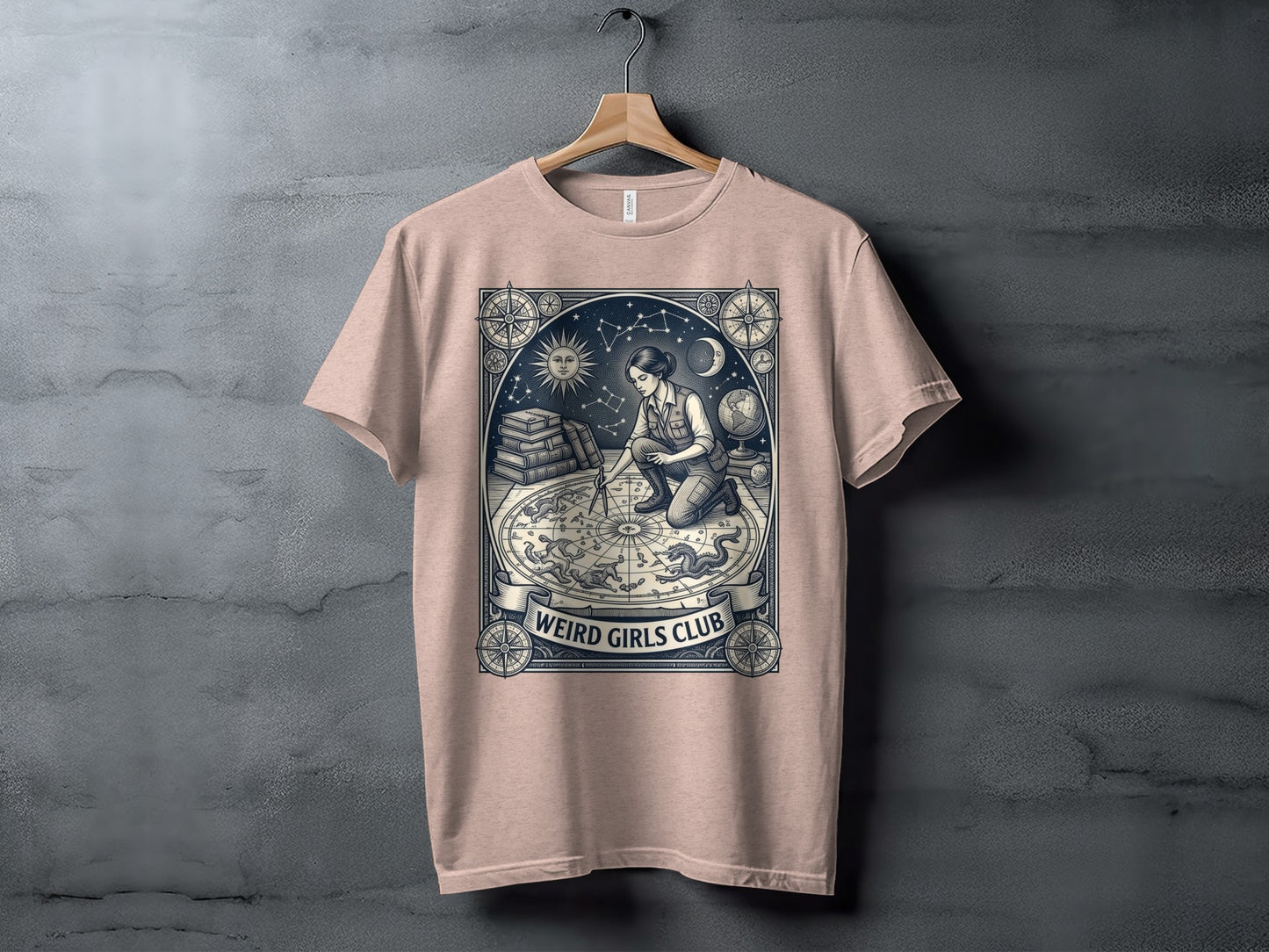 T-shirt with celestial map and "Weird Girls Club" text.