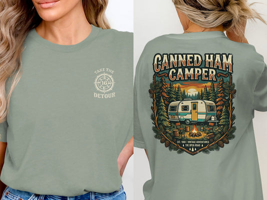 Green t-shirt with "Take the Detour" on front and "Canned Ham Camper" graphic on back.