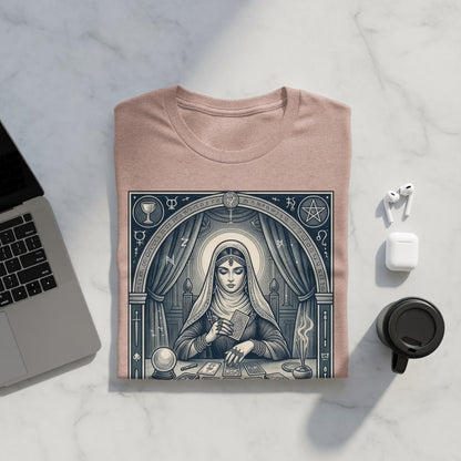 Woman in robes with tarot cards, crystal ball, and celestial symbols on t-shirt.