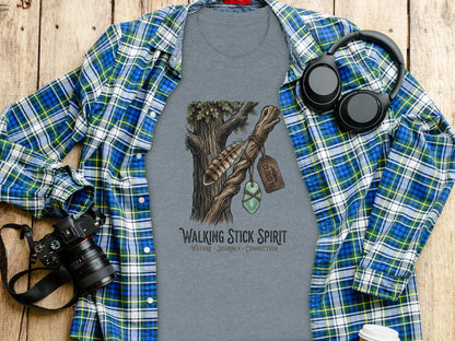 Heritage Walking Stick Spirit: Journey Nomad Tee: T-shirt with "Walking Stick Spirit" design featuring a tree, feather, and cloud charm.