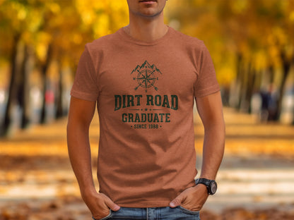 The Original Dirt Road Graduate Outdoor Adventure Top: Brown t-shirt with "DIRT ROAD SINCE 1988" text and compass graphic.