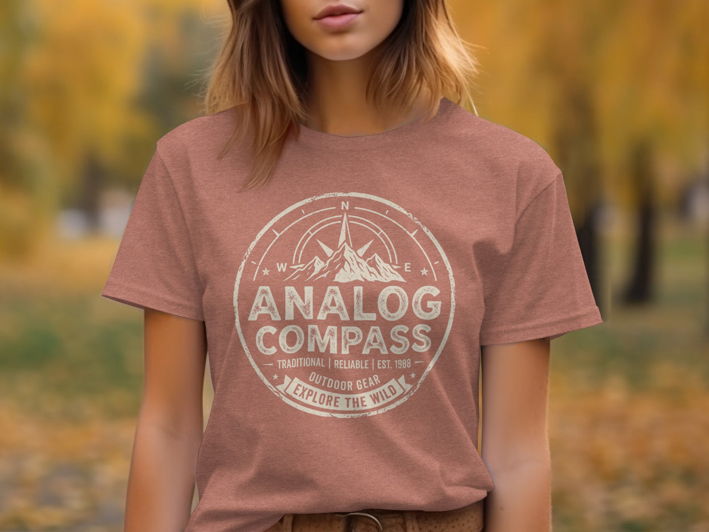 Analog Compass Heritage: The Explorer's Adventure Tee: Red t-shirt with Analog Compass outdoor gear graphic and text.