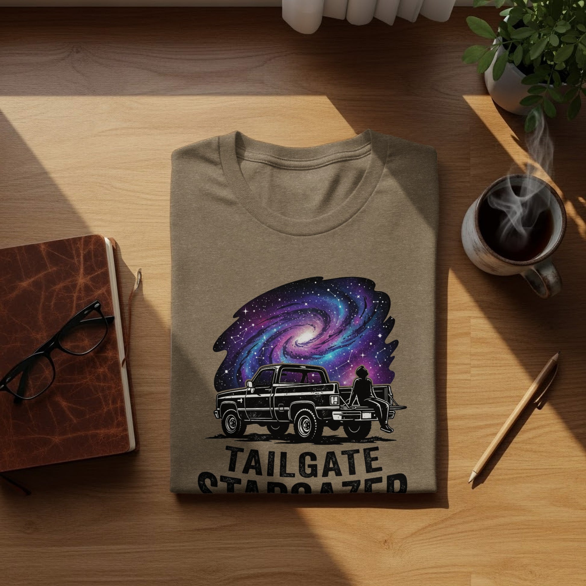 Heritage Cosmic Tailgate Stargazer Nomad Tee: T-shirt with graphic of truck and starry night sky, "Tailgate Stargazed" text.
